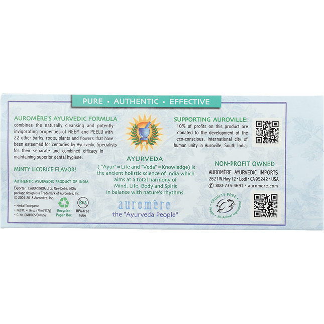Back of Auromere Classic neem toothpaste carton describing the Ayurvedic formula and Auroville support
