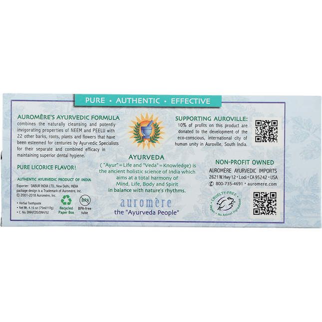 Back of Auromere Mint-free ayurvedic toothpaste carton describing the Ayurvedic formula and Auroville support
