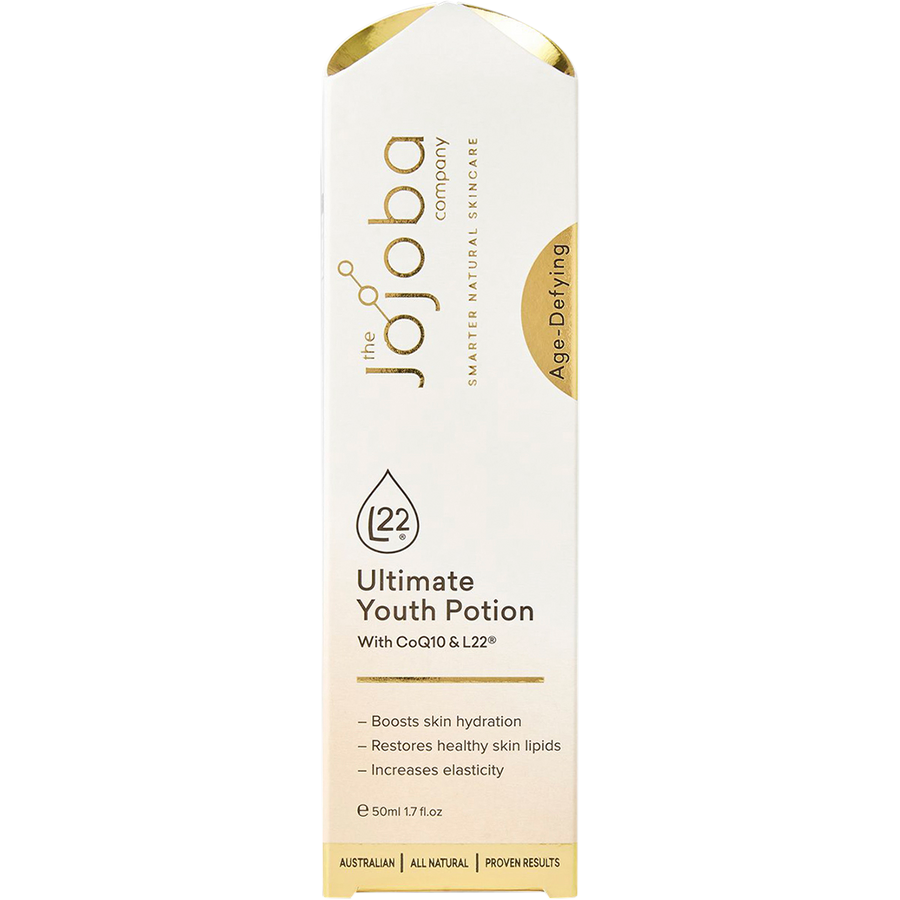Woman applying Jojoba Ultimate Youth Potion with CoQ10 for youthful glowing skin