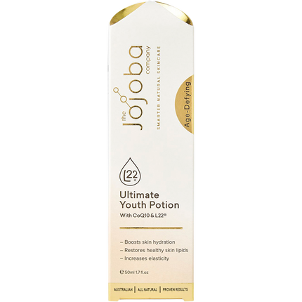 Woman applying Jojoba Ultimate Youth Potion with CoQ10 for youthful glowing skin