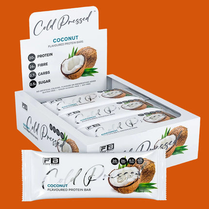Box of Cold Pressed coconut protein bars on a white background