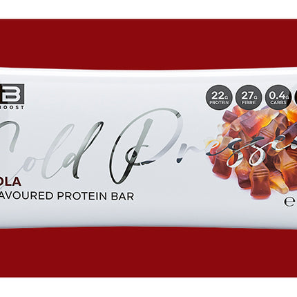 Protein bar packaging with cola flavor on a red background