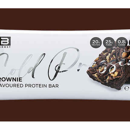Brownie-flavored protein bar packaging with visible branding on a brown background