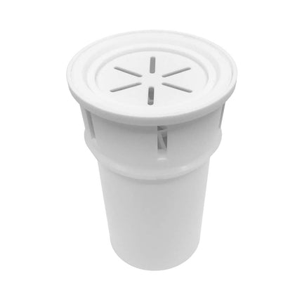 White plastic drain cover with star-shaped center on a white background