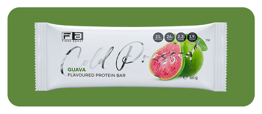 Guava-flavored protein bar packaging on a green background