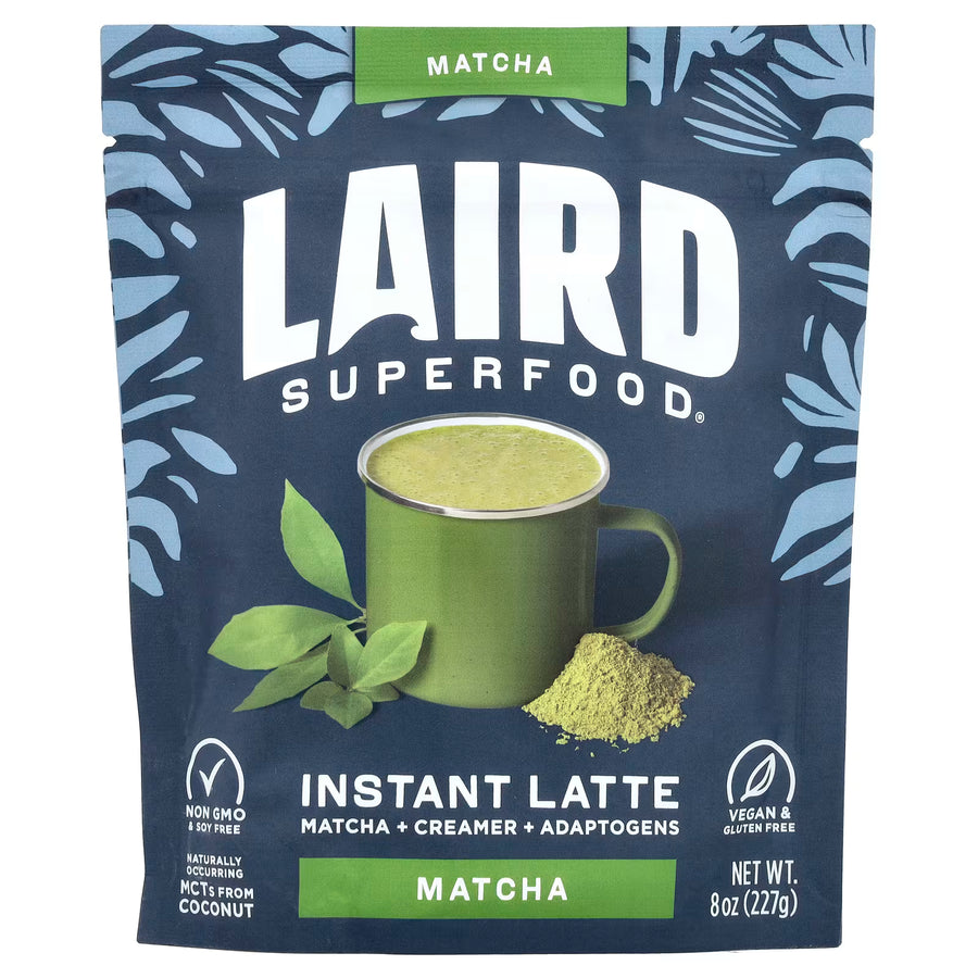 Laird Superfood Matcha Instant Latte package with a green mug and matcha leaves on a blue background.