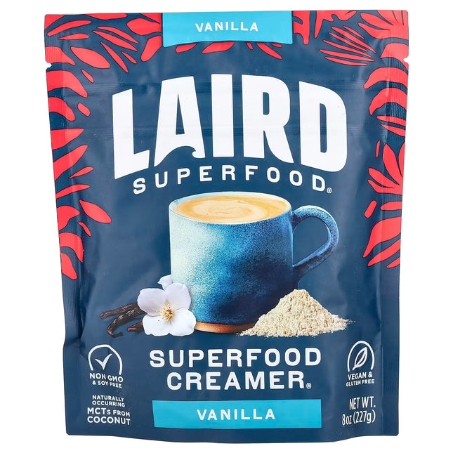 Laird Superfood Vanilla Creamer package with a cup of coffee and vanilla beans on a blue background.