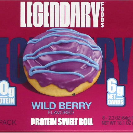 Box of Legendary Foods Wild Berry flavored protein sweet roll with purple frosting on a red background.