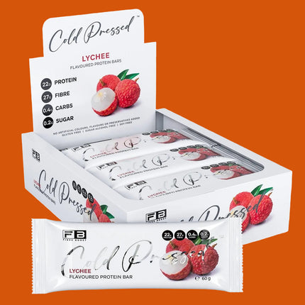 Box of Cold Pressed Lychee protein bars with packaging displaying lychee fruit and branding.