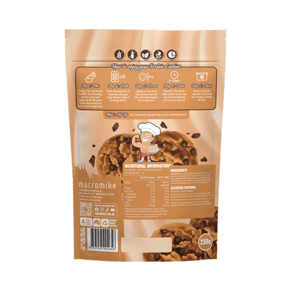 Macro Mike Protein Cookie Baking Mix Choc Chip 250g with fresh-baked chocolate chip protein cookies on a rustic plate.