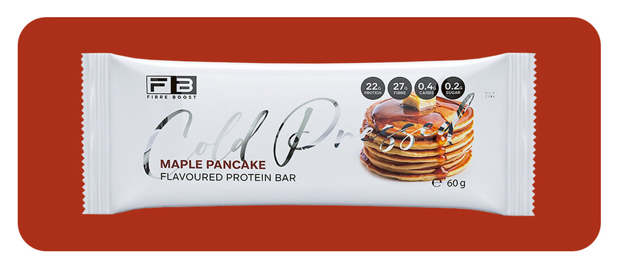 Protein bar packaging with 'Fibre By' branding on a red background