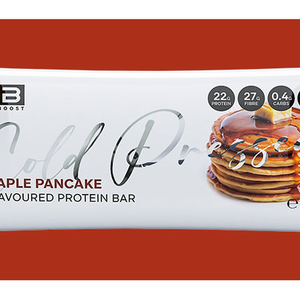 Protein bar packaging with 'Fibre By' branding on a red background