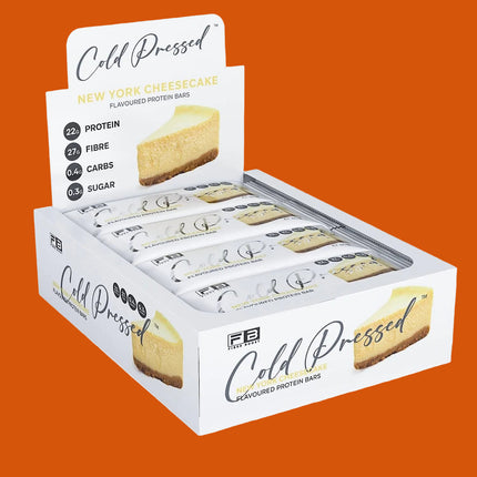 Box of Cold Pressed protein bars on a white background