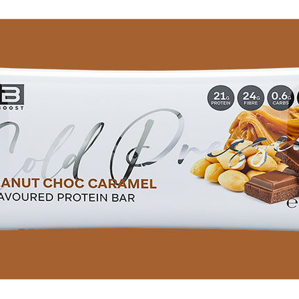 Peanut Choc Caramel flavored protein bar packaging on a brown background