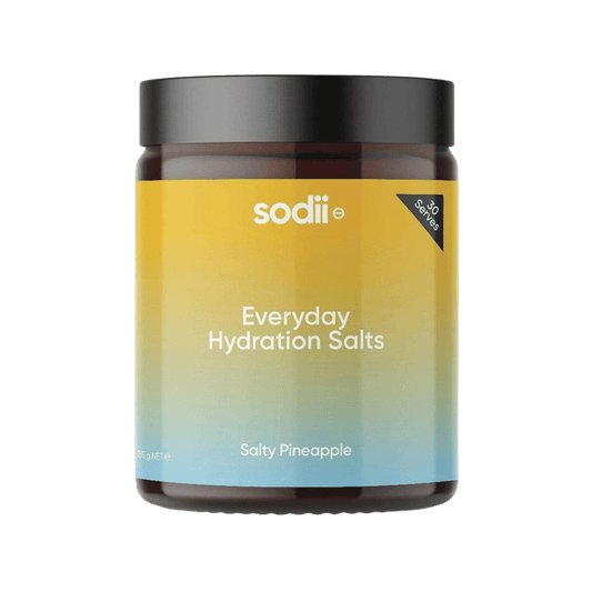 Jar of 'Everyday Hydration Salts' by sodii with a gradient label on a green background