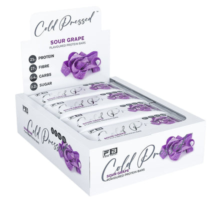 Box of Cold Pressed protein bars with purple flowers on a white background
