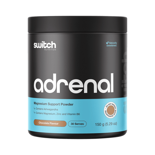 Container of switch Nutrition Adrenal Magnesium Support Powder on a green background