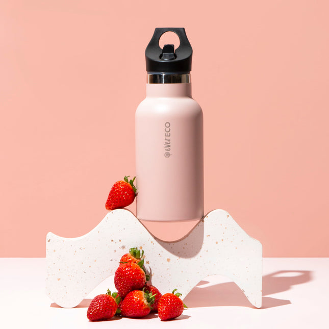 Ever Eco Rose 350ml insulated bottle with sip lid styled with strawberries