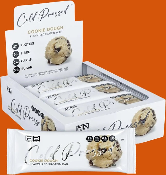 Box of Fibre Boost Cold Pressed Cookie Dough protein bars with packaging on a white background