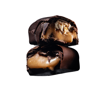 Cut-open chocolate bar showing gooey vegan butterscotch caramel centre